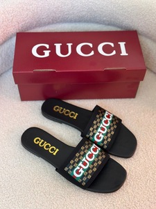 Black GUCCI slipper