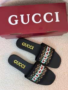 Black GUCCI slipper