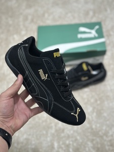 Puma shoes black gold