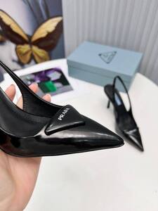 Black Prada heels