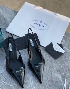 Black Prada heels
