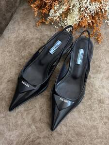 Black Prada heels